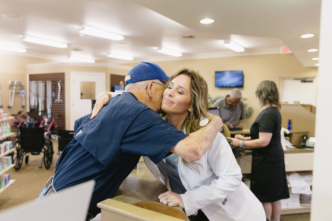 A Mitchell's Pharmacy pharmacist embracing a longtime patient