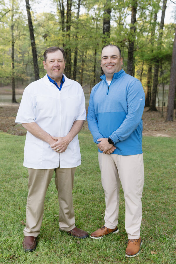 Owner Dwayne Mitchell, RPh. with manager Peyton Mitchell